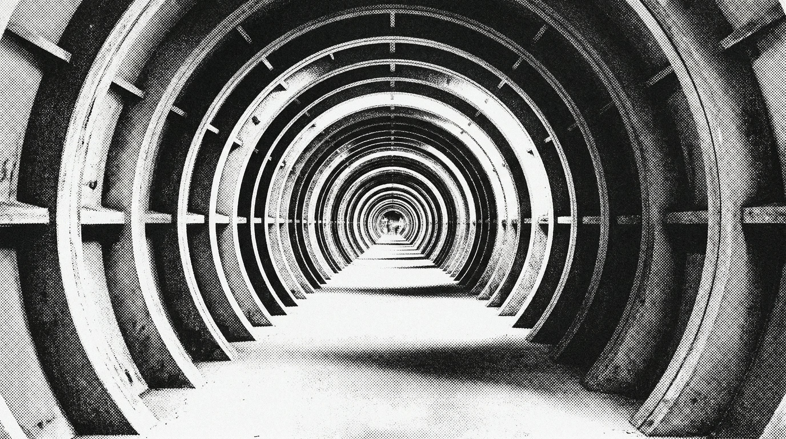 Digital illustration for article section "Proving Grounds and Production Scale" in "MESH Robotics Lands ABB, Shimizu Backing in Construction Tech Push" - A minimalist, conceptual architectural depiction of a massive, modern underground tunnel interior, s...
