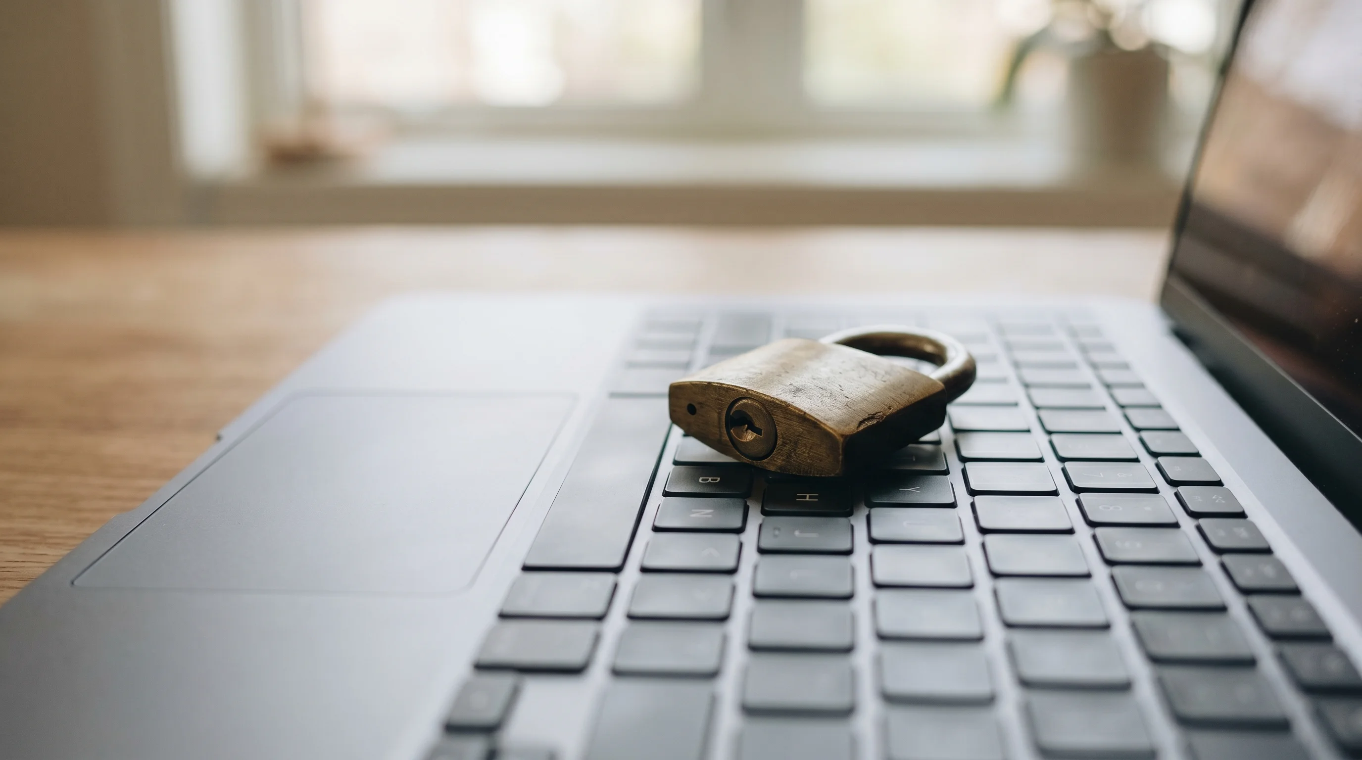 Digital illustration for article section "The Trust Question" in "Complir Brings AI Agents to Cross-Border Retail Compliance" - Show an image of a padlock sitting on a keyboard, representing the question of trust in AI-generated...