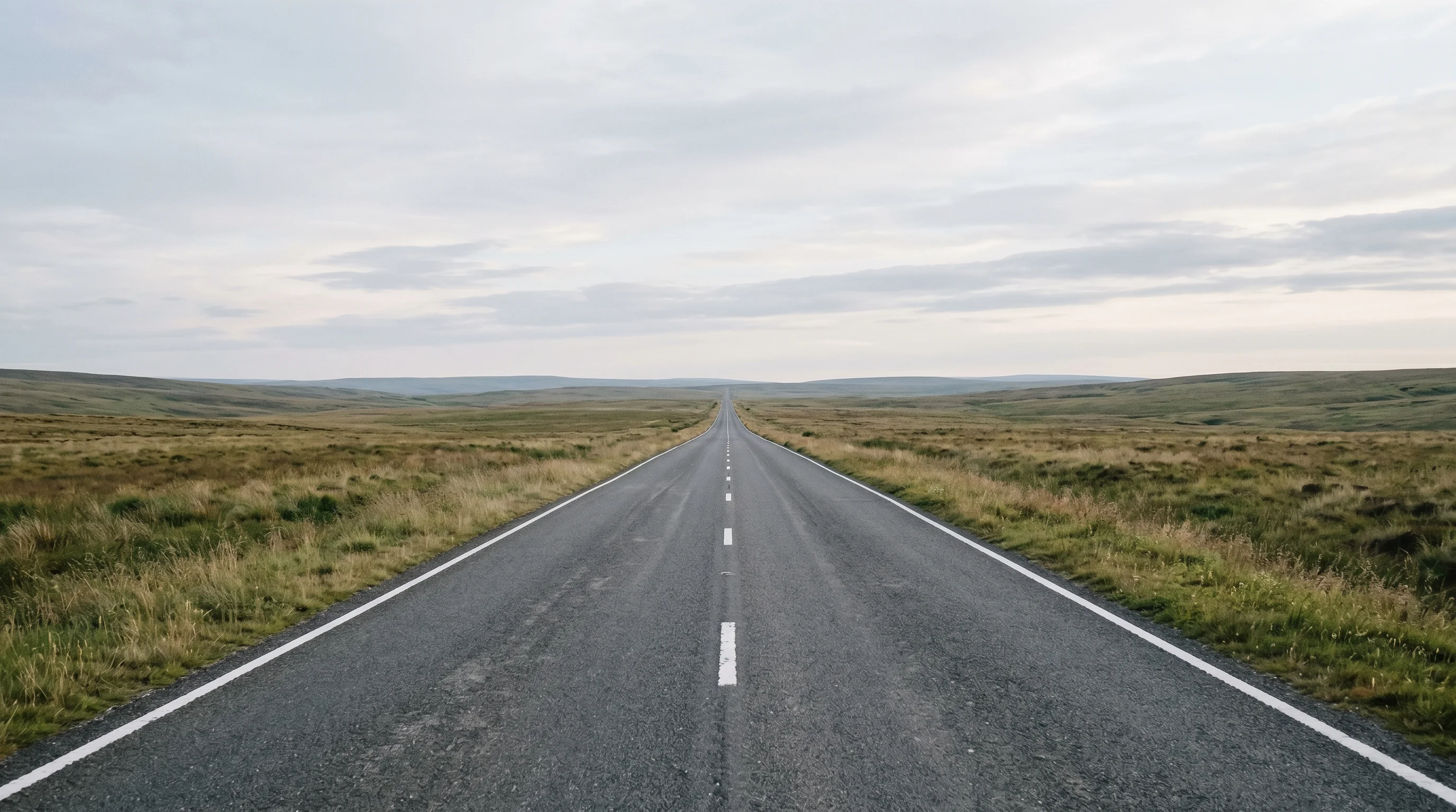Digital illustration for article section "The Road Ahead" in "YC-Backed Indexable Launches Git-Like Version Control for AI Agent VMs" - Create an image that symbolizes 'the road ahead'. Capture a minimalist photograph of a road stretchi...